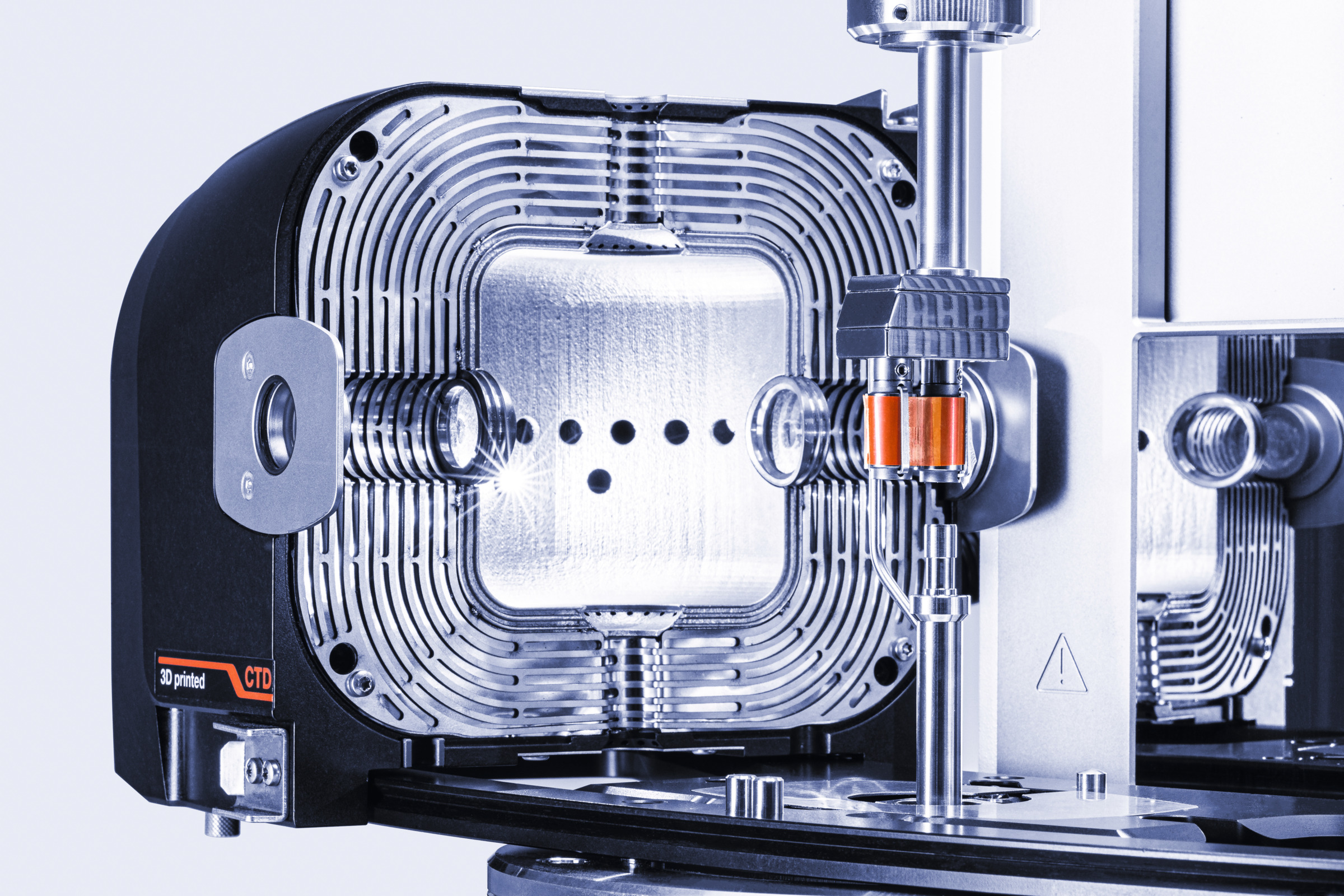 Close-up of an Anton Paar 3D printed CTD temperature device with metal chamber, optics, and measuring geometry