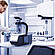 Technician adjusts an Anton Paar Modular Compact Rheometer MCR 503 with temperature accessory beside another Anton Paar rheometer