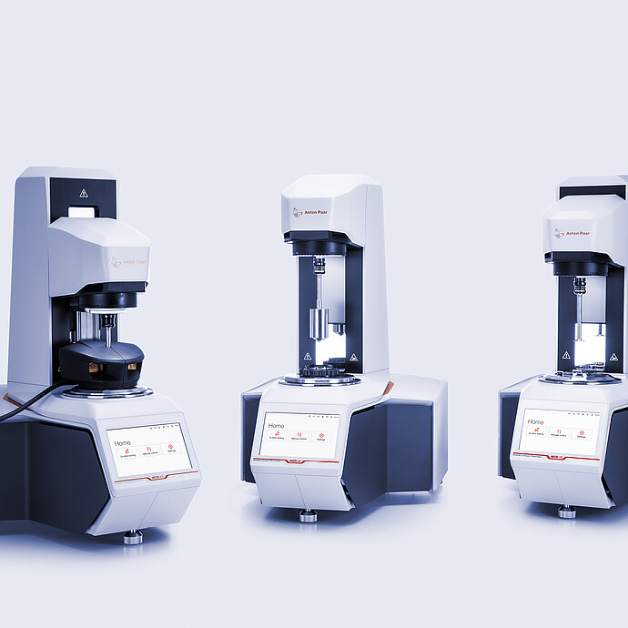 Three Anton Paar Entry Level Rheometer MCR instruments with different measuring setups and touchscreen home menus.