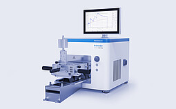Brabender MetaStation 4E modular torque rheometer with mixing attachment and monitor displaying torque, speed, and temperature curves.