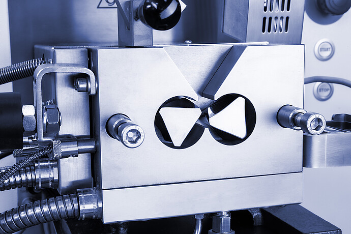 Close-up of the stainless-steel twin-rotor mixing chamber on a Brabender MetaStation modular torque rheometer.