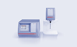 Anton Paar DSR 502 control unit and DSR 502 measuring head on a stand with spindle, shown against a light gray background