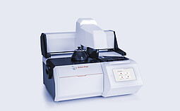 Anton Paar Julia DSC 500 with automated sample changer and integrated touchscreen showing home menu, on a neutral background