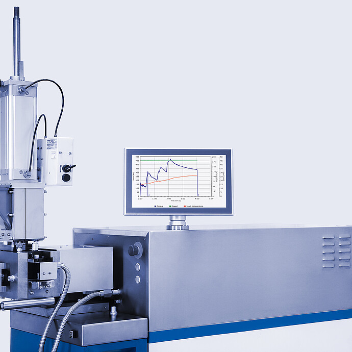Brabender MetaStation modular torque rheometer with vertical feed attachment and monitor showing torque, speed, and temperature curves.