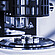 Close-up of the measuring geometry above a polymer sample on the plate of an Anton Paar SmartMelt polymer melt rheometer.