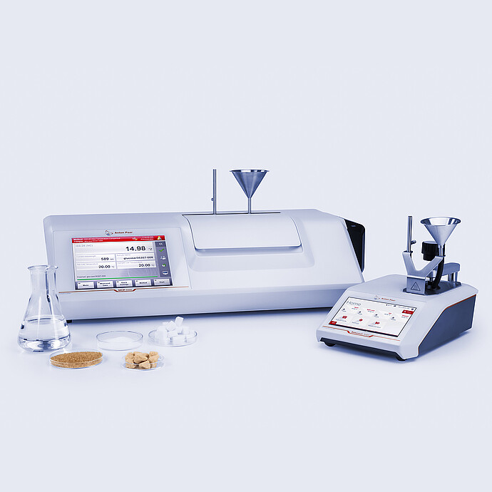 MCP Sucromat polarimeter and Abbemat refractometer with sugar samples and glassware for measuring sugar content, dry substance, and purity.