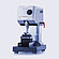 Side view of the Anton Paar Revetest® Scratch Tester RST 100, showing the control head, indenter, and base used for material surface testing.