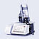 Anton Paar DMA 5002 density meter with Xsample 610 sample changer on top, bottle holder, black tubing, and separate Xsample module