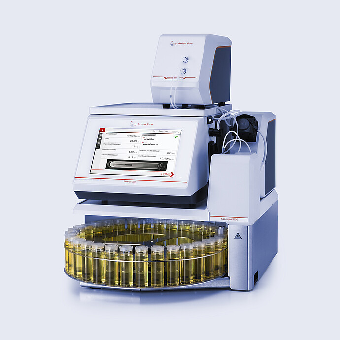 Anton Paar RTD Measurement System with DMA 6002, Alcolyzer Beer, and Xsample 5100, with yellow liquid vials in the autosampler.