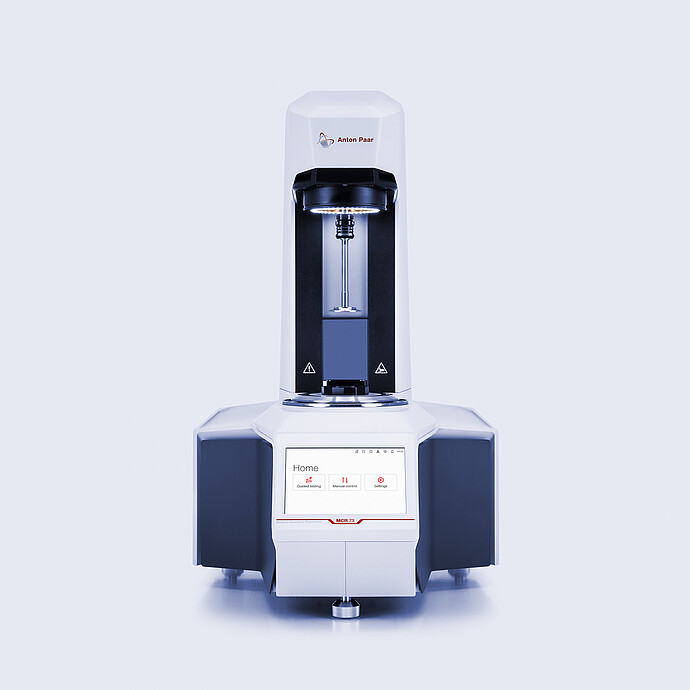 Anton Paar MCR 73 Modular Compact Rheometer in front view with open measuring area and touchscreen home menu.