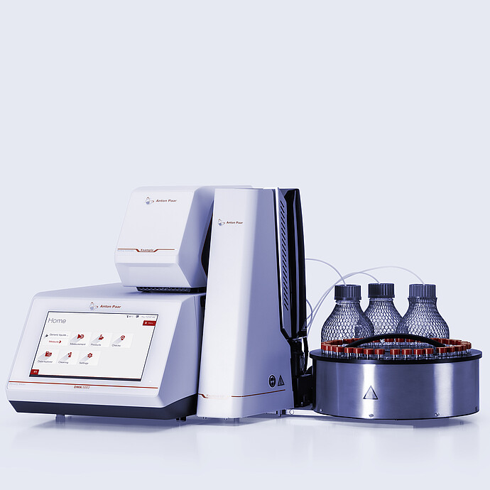 Anton Paar DMA 5002 density meter with Xsample 631 sample changer, vial carousel, bottles, tubing, and Xsample module
