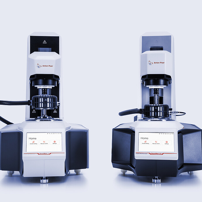 Anton Paar SmartMelt 73 and SmartMelt 303 polymer melt rheometers shown side by side on a light background.