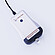 Anton Paar Enzymatic Reader digital ethanol meter with inserted test strip, illuminated button, and USB cable on gray background.