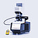 Anton Paar SmartPave 303 rheometer with connected temperature-control hoses and a handheld digital meter on a light background.