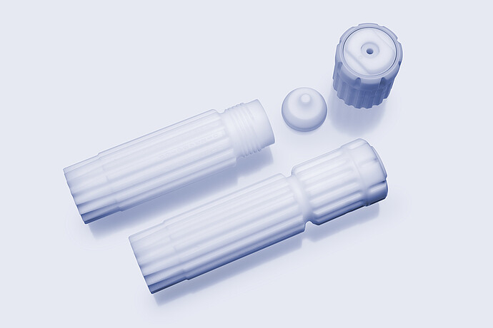 HVT Rotor vessel components including two digestion vessels, screw cap, and sealing insert arranged on a light background