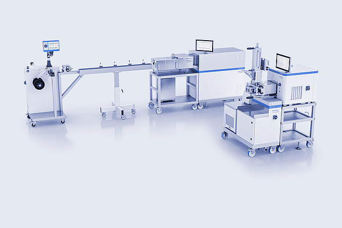 TwinLab Series with Brabender B-TSE-A 12/36 twin-screw extruder, MetaStation units, downstream line and monitors in a studio setup.