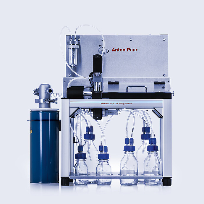 PoreMaster eGaIn Filling Station with six lab bottles connected by tubing, integrated valve unit, and pressure vessel on the left.