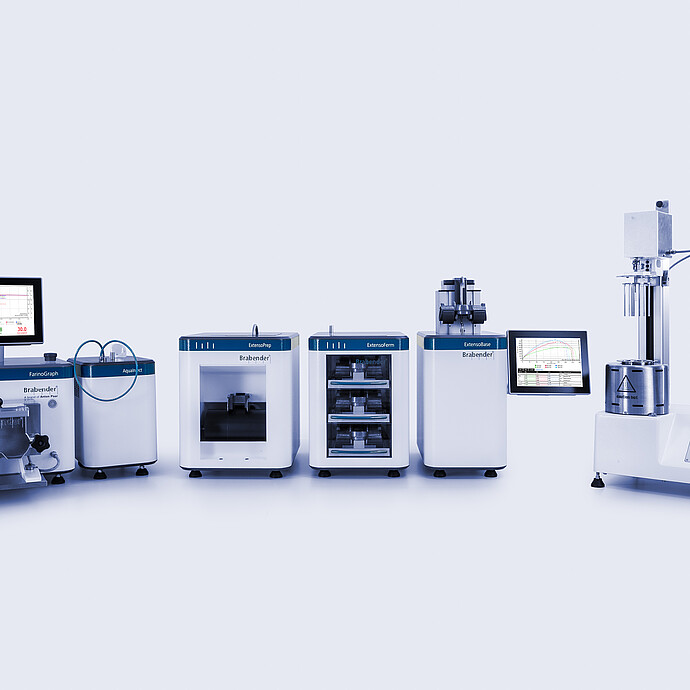 Brabender FarinoGraph with Aquinject, ExtensoPrep, ExtensoForm, ExtensoBase, ExtensoGraph, and Amylograph-E aligned with monitors in a laboratory setup for dough and flour analysis