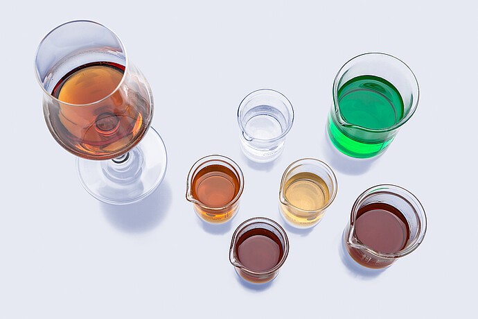 Lab glassware with amber, clear, and green liquid samples for the Anton Paar RTD Measurement System.