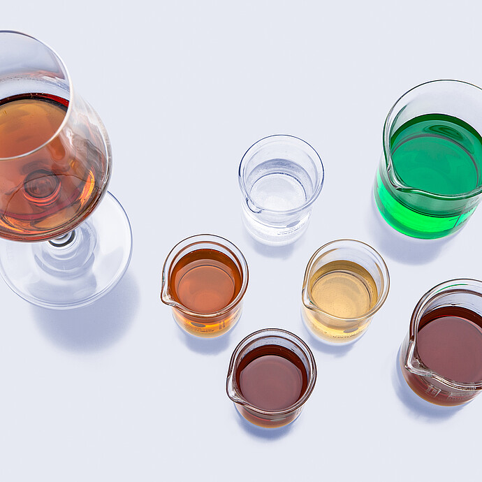 Lab glassware with amber, clear, and green liquid samples for the Anton Paar RTD Measurement System.