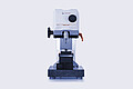 Front view of the Anton Paar Revetest® Scratch Tester RST 100, showing the control head, indenter, and testing base used for material surface testing.