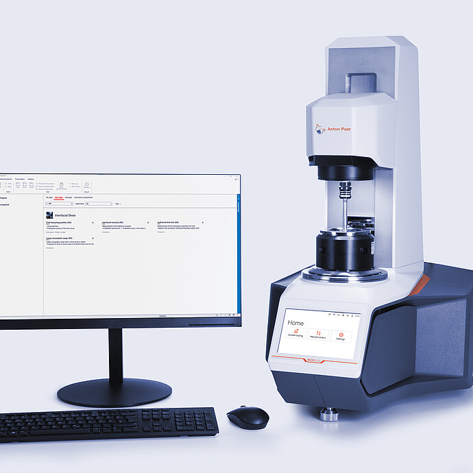 Anton Paar Modular Compact Rheometer MCR 503 with RheoCompass software on a monitor, keyboard, and mouse