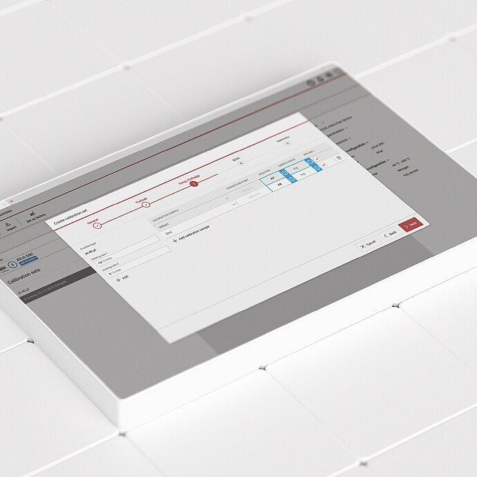 Julia Suite software interface showing a 96-well plate layout and measurement table on a white tiled surface