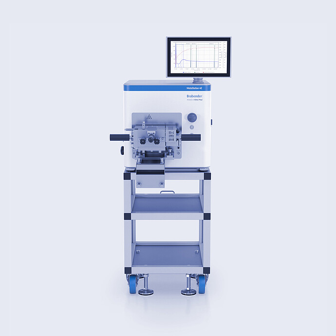 Front view of the Brabender MetaStation 4E modular torque rheometer with test attachment, graph display, and wheeled laboratory stand.