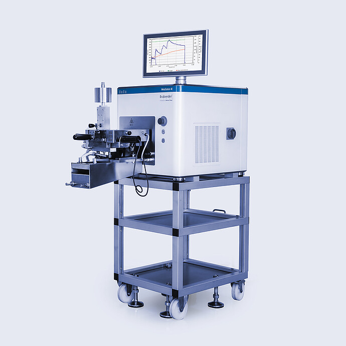 Brabender MetaStation 4E modular torque rheometer with front test module and graph display, mounted on a wheeled laboratory stand.