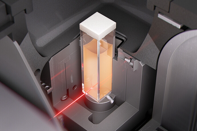 Close-up rendering of a cuvette with liquid sample inside the Anton Paar Litesizer DLS, illuminated by a red laser beam