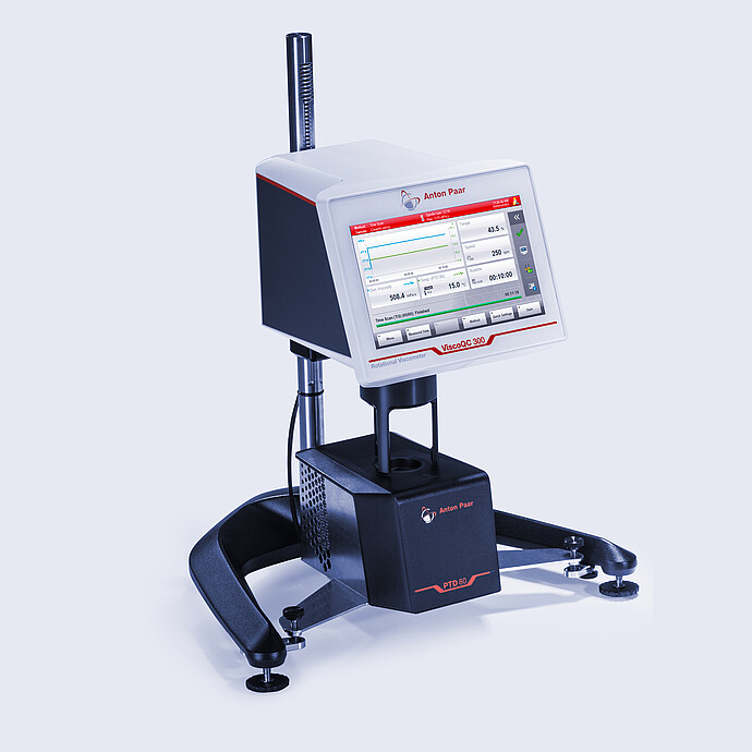 Three-quarter front view of the ViscoQC 300 rotational viscometer with the PTD 80 Peltier temperature device against a light blue background