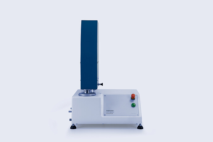 Front view of the Brabender GlutoPeak gluten quality analyzer, showing the control panel, mixing chamber, and upright motor housing.