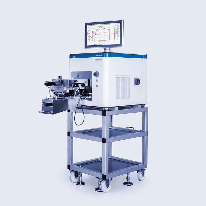 Brabender MetaStation 4E modular torque rheometer with front test module and graph display, mounted on a wheeled laboratory stand.