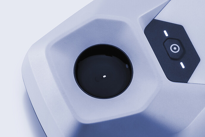 Close-up view of the Anton Paar pH2Go digital pH meter, focusing on the circular sample well and illuminated control button.