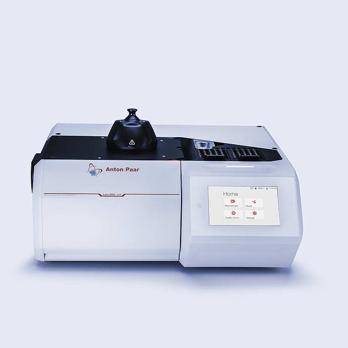 Anton Paar Julia DSC 300 differential scanning calorimeter with integrated touchscreen showing home menu, on a neutral background