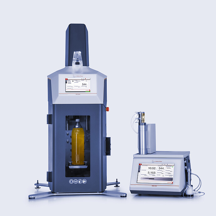 Anton Paar TPO with soft drink bottle in chamber connected to DMA 6002 density meter with Xsample filling unit