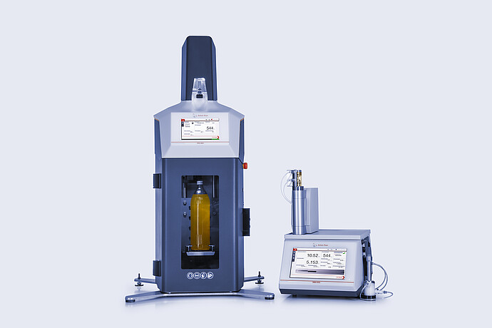 Anton Paar TPO with soft drink bottle in chamber connected to DMA 6002 density meter with Xsample filling unit