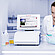 Laboratory technician injects a sample into the Lyza Flow Cell connected to an Anton Paar Lyza 7000 FTIR spectrometer.