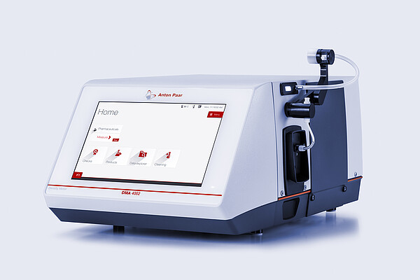 Front view of the Anton Paar DMA 4002 benchtop density meter with touchscreen interface and attached filling module for sample input.
