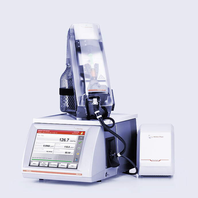 Anton Paar SVM 3001 viscometer with Xsample 610 sample changer on top, bottle holder, black tubing, and external Xsample module