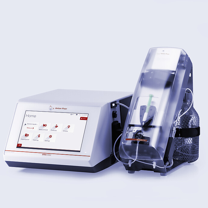 Anton Paar DMA 5002 density meter with touchscreen connected to Xsample 340 sample changer under a clear cover and bottle