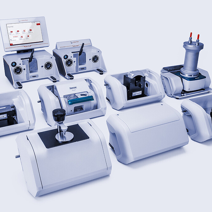 Anton Paar Lyza 7000 and Lyza 3000 FTIR spectrometers surrounded by interchangeable sampling modules and accessories.
