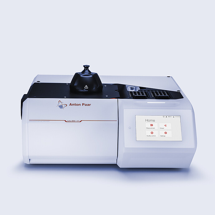 Anton Paar Julia DSC 300 differential scanning calorimeter with integrated touchscreen showing home menu, on a neutral background