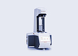 Anton Paar MCR 53 Modular Compact Rheometer in three-quarter view with open measuring area and touchscreen home menu.