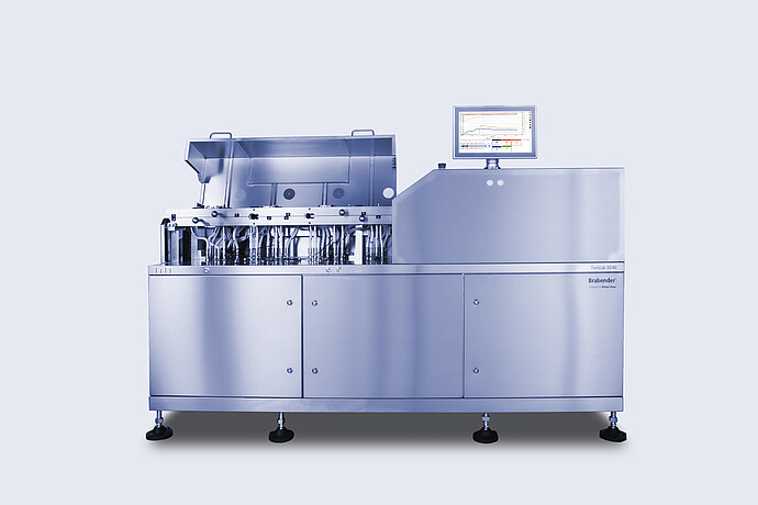 Front view of Brabender TwinLab B-TSE-S-30-40 twin-screw extruder with open process section, visible piping, and top-mounted touchscreen