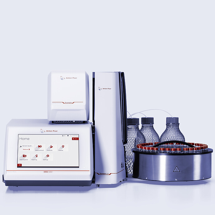 Anton Paar DMA 5002 density meter with Xsample Heating Controller and Xsample 631 sample changer, vial carousel, bottles, and tubing