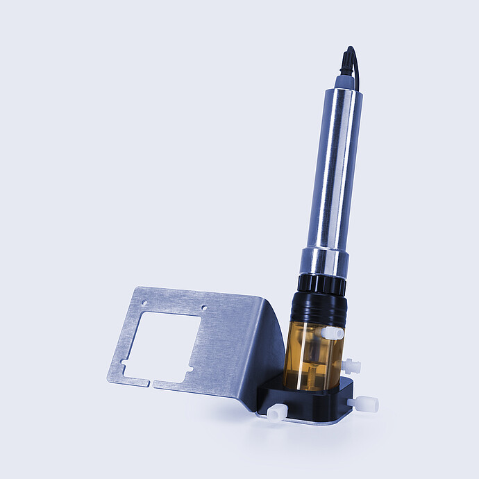 Anton Paar pH 3301 sensor with stainless steel probe, transparent flow cell, and mounted metal bracket with fluid connections