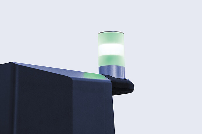 Close-up of the status indicator light on the Anton Paar TPO 5001, illuminated green to signal operational readiness.