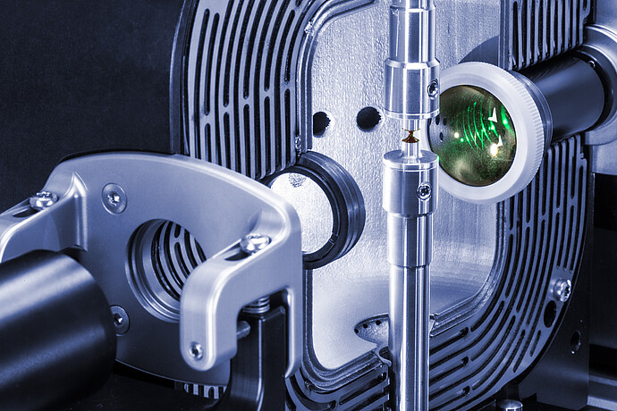 Close-up of the capillary-breakup fixture, camera and sample area on an MCR 703 MultiDrive for extensional rheology