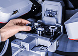 XRDynamic Autosampler with vertical sample magazines holding samples for automated X-ray diffraction.